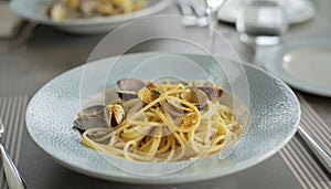 Spaghetti pasta with clams and bottarga, Mediterranean food