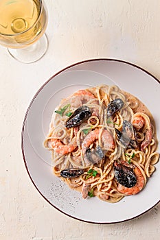 Spaghetti, pasta, with seafood, shrimp with mussels, in creamy garlic sauce, homemade, no people,