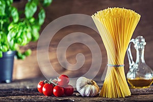 Spaghetti. Pasta spaghetti with basil garlic tomatoes cheese parmesan and olive oil