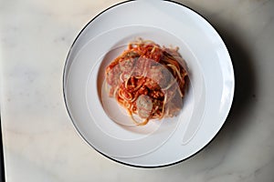 Spaghetti Pasta with Tomato Sauce, Smiley Potato fry. Traditional Italian Food