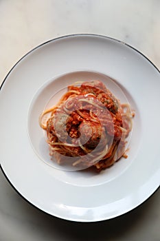 Spaghetti Pasta with Tomato Sauce, Smiley Potato fry. Traditional Italian Food