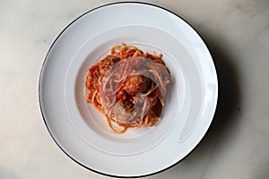 Spaghetti Pasta with Tomato Sauce, Smiley Potato fry. Traditional Italian Food