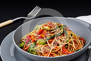 African traditional Spaghetti pasta with spicy sauce and vegetable