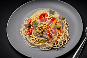 African traditional Spaghetti pasta with spicy sauce and vegetable