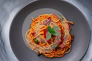 African traditional Spaghetti pasta with spicy sauce and vegetable