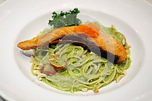 Spaghetti presto sauce with steak salmon photo