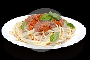 Spaghetti ragu bolognese sauce on black,close up