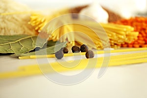 spaghetti, rice, pasta and lentils on the table