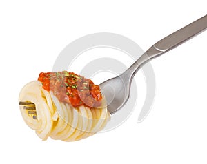 Spaghetti and sauce on a fork isolated