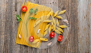 Spaghetti and spices, additional textspace left, topview photo