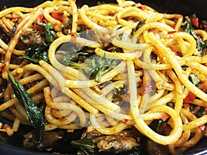 Spaghetti Spicy with Baby Clams Thai Food Style Thai ingredient peppers,onion,chili,soy sauce and Basil Goodtasty Spices Dish