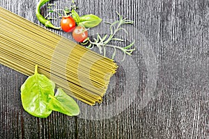 Spaghetti spinach on dark board top