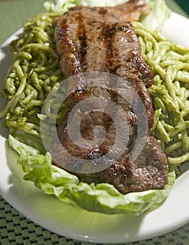 Spaghetti tallarin saltado steak Peruvian food photo