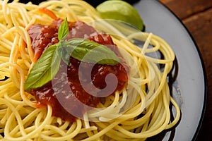 Spaghetti with tomatoe sauce and their ingredients arround,adjustment size for banner,cover and header.