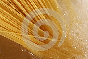 The spaghetti was put in boiling water. Close-up