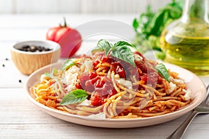 spaguetti with tomato and basil sauce photo