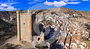 Spain, Alcala de Jucar - scenic medieval village located in the rocks. photo