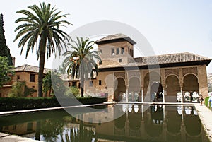 Spain, Andalusia, Granada, Alhambra Palace Pavilion and reflection in a pool