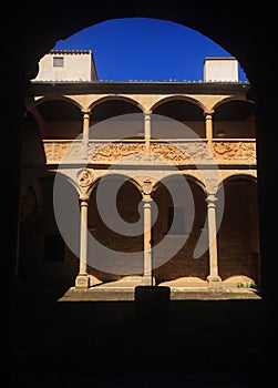 Spain, Castilla y Leon, Ciudad Rodrigo. Vignette frame the Aguila Palace patio. photo