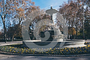 SPAIN - DECEMBER 13: fountain with roman sculptures at Retiro Park, DECEMBER 13, 2017 in Madrid, Spain