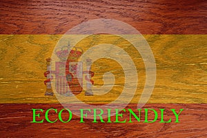 Spain flag on wooden background for global eco friendly environment, ecological and environmental saving and go green country