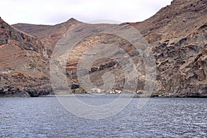 Spain La Gomera island playa la cantera abandoned fish factory from the sea photo