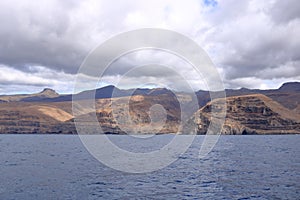 Spain La Gomera island playa la cantera abandoned fish factory from the sea photo