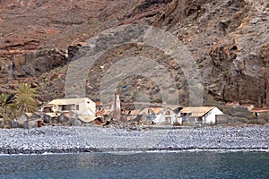 Spain La Gomera island playa la cantera abandoned fish factory from the sea photo