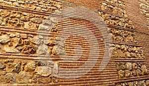 Spain, Madrid, 6 Calle de San Nicols, Capilla de la Dolorosa, wall of brick and stone photo