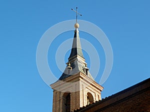 Spain, Madrid, 11 Calle de San Nicols, Iglesia de San Nicols de los Servitas, bell tower and spire of the church photo