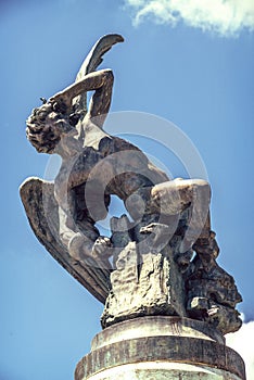 Spain, Madrid, Fallen Angel sculpture in Retiro Park