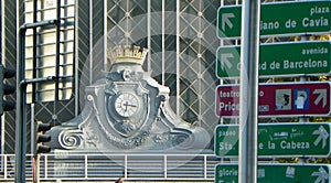 Spain, Madrid, Plaza del Emperador Carlos V, Atocha-Cercanias railway station, emblem with coats of arms and clock photo