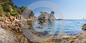 Spain Mediterranean Sea, Bay in Lloret de Mar. beautiful seaside bay in Costa Brava. Amazing seascape of Rocks and stones