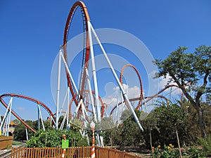 Spain, Salou-September, 2011: People on Red Roller Coaster.port aventura