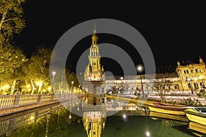 Spain Square Plaza de Espana at night, Seville, Spain, built on 1928, it is one example of the Regionalism Architecture mixing