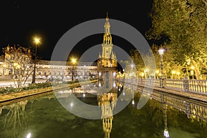 Spain Square Plaza de Espana at night, Seville, Spain, built on 1928, it is one example of the Regionalism Architecture mixing