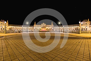 Spain Square Plaza de Espana at night, Seville, Spain, built on 1928, it is one example of the Regionalism Architecture mixing