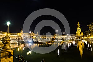 Spain Square Plaza de Espana at night, Seville, Spain, built on 1928, it is one example of the Regionalism Architecture mixing