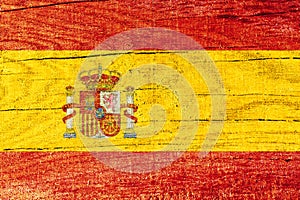 Spainish national flag printed on wooden cracked surface