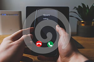 Spam call on phone. Spammer incoming call concept photo