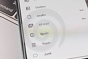 Spam in email inbox. Email inbox on smartphone - junk, trash, spam