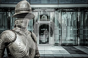 Spam.Medieval armor protecting a business building. Concept of f