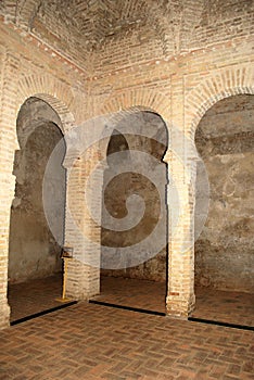 Decorative columns inside the Arab Baths within the castle grounds, Jerez de la Frontera, Spain. photo