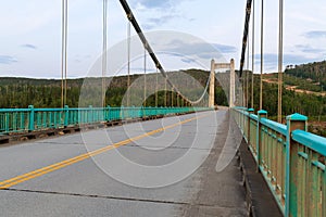 Span of the Peace River Suspension Bridge in Hudson`s Hope, British Columbia, Canada