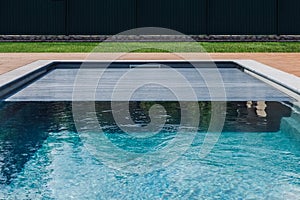 Span for pool. Rolling coating. Pool protection. Rollete. Security. Pure water. Pool protection system
