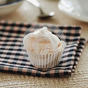 spanish baked meringue with almonds on a table