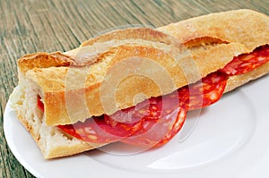 Spanish bocadillo de chorizo, a chorizo sandwich photo