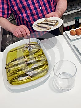 Spanish Boquerones (anchovies marinated in oil).