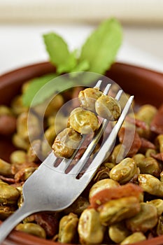 Spanish broad bean stew with serrano ham