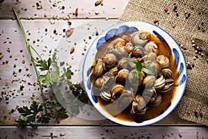 Spanish caracoles en salsa, cooked snails in sauce